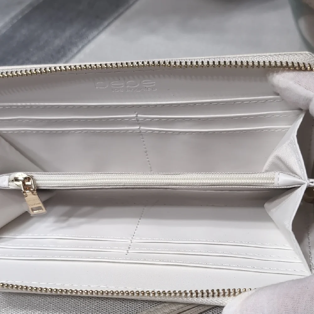 bebe White Zip Wristlet Clutch with Gold Logo